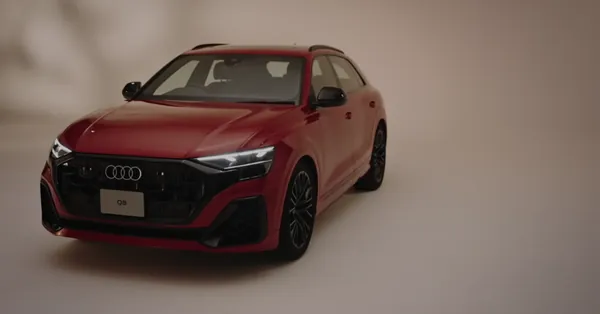 The Audi Q8 edition one in a warm studio